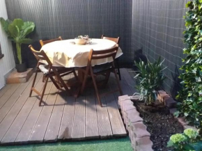 Maison de ville avec patio 1 chambre